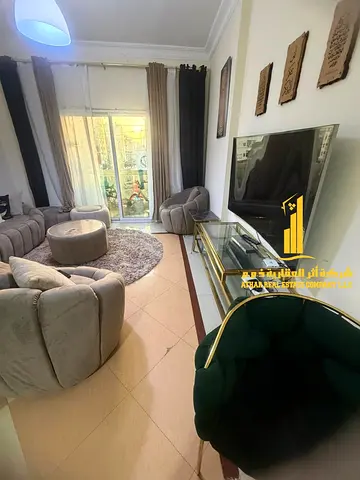 Luxurious two-bedroom apartment with a living room, fully furnished, and featuring a balcony. Located in Al Nuaimiya, Ajman.