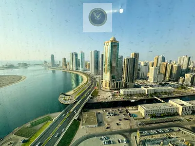 Free air conditioning | Parking, gym & swimming pool | Open view of Al Qasba | Near Dubai exit | On Al Khan Beach