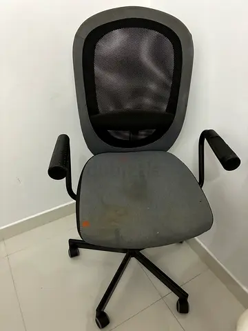 Used grey mesh office chair with armrests (some stains)