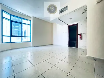 Most beautiful and largest studio in Al Qasimia, central AC, spacious, new finishes, open view, prime location close to all services.