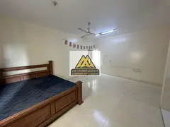 A spacious studio for annual rent in Al Nakheel 1 – Ajman, featuring a separate kitchen and excell