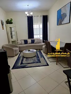 Furnished one-bedroom apartment for monthly rent in Ajman - Al Rashidiya - Orient Towers | Stylish a