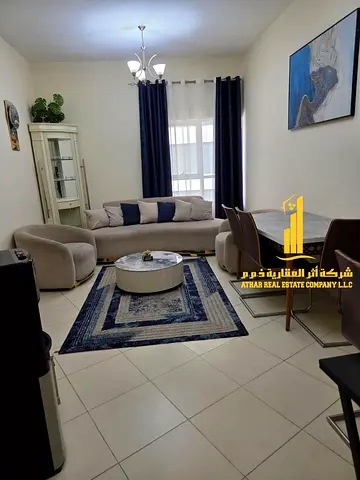 Furnished one-bedroom apartment for monthly rent in Ajman - Al Rashidiya - Orient Towers | Stylish and tidy furnishings | Includes bills and internet