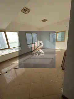 Three-bedroom apartment with a living room for rent in the Al Taawun area in Sharjah, in a prime loc