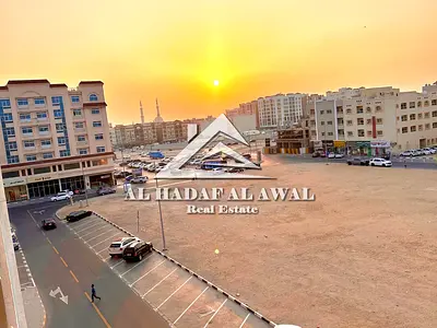 One bedroom and living room apartment for monthly rent in the Muwailih commercial area, with free internet and parking.