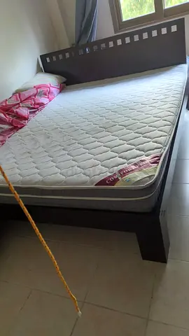 Bed with mattress