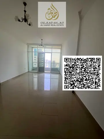 One bedroom and living room with two bathrooms, balcony, open view, gym, free swimming pool, luxurious finishes, close to Dubai exit, flexible payment