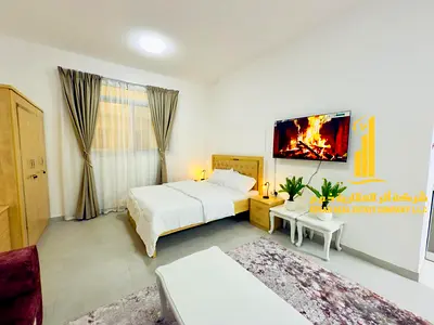 Furnished two-bedroom apartment with a living room for rent in Ajman, clean and tidy furnishings. Located on the Ajman Corniche. All bills