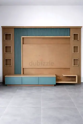 Modern wooden entertainment unit with storage and blue paneling