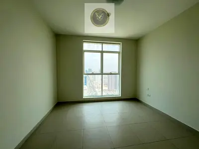 2 bedroom for rent two balconies free parking near Dubai and services on Al Taawun Street