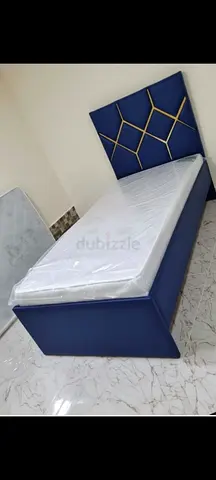 Modern Blue Single Bed with Gold Geometric Headboard