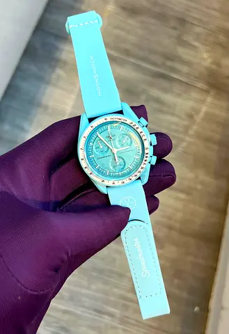Light Blue Swatch Chronograph Watch