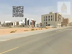 Residential and commercial corner land in Al Bahia