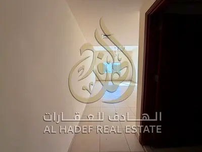 شقة غرفتين وصالة مع بلكونة للإيجار في أبو شغارة شارع الوحدة | قريب من مخرج دبي | تكييف مركزي | 2 حمام | دفعات 4 | 40 ألف سنوي