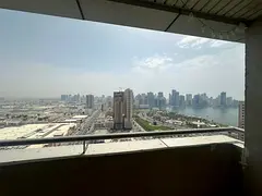 Two-bedroom apartment with living room for annual rent in Al Majaz 2, Sharjah. 3 bathrooms, near Al