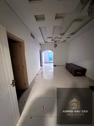 2BR apartment in Al Muwaihat Ajman master room built in wardrobes 2 bathrooms quiet family location 1 month close to service
