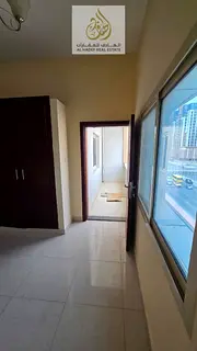 Spacious three-bedroom apartment with a living room, two balconies, and a direct view of Al Ittihad