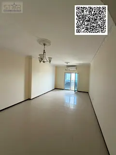 Two rooms and a living room, 2 bathrooms with a balcony, open view of Sharjah. Annual rent in Ajman