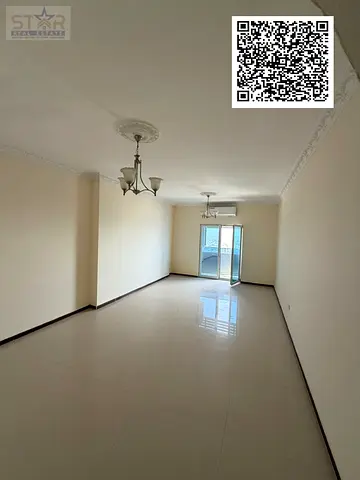 Two rooms and a living room, 2 bathrooms with a balcony, open view of Sharjah. Annual rent in Ajman
