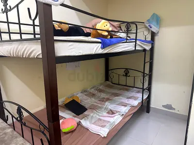 Double decker wooden bed