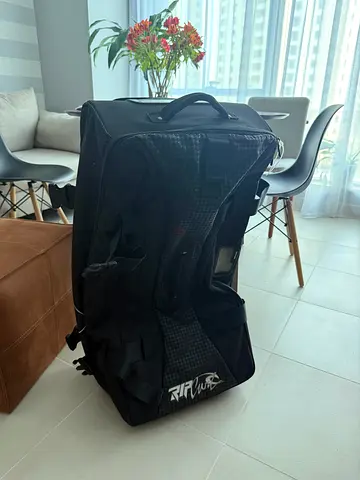 Large black duffel bag - sturdy with wheels and retractable handle