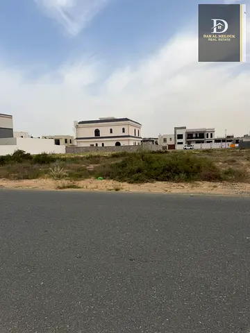 For Sale in Sharjah Al Hooshi Area Residential Land in a Prime Location Front and Back Streets Freehold for Arabs