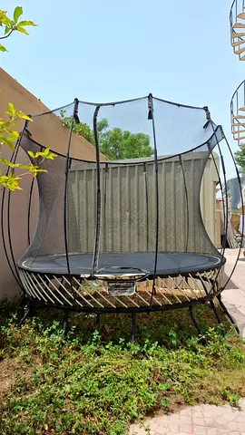 Large Round Outdoor Trampoline with Safety Enclosure - Good Condition