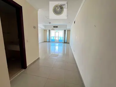 Largest three-bedroom apartment with a living room, free air conditioning, and a gym