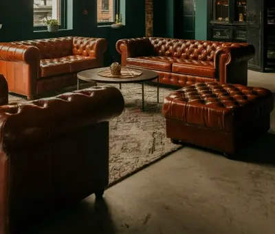 Brand new Set of Brown Leather Chesterfield Sofas and Ottoman