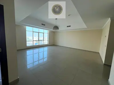 اجمل واكبر غرفتين وصاله بالتعاون\بلكونه\اطلاله مفتوحه\تكيف مركزي مجاني\جيم\تشطيبات ممتازه\موقع مميز علي مخرج دبي\قريب من كل الخدمات