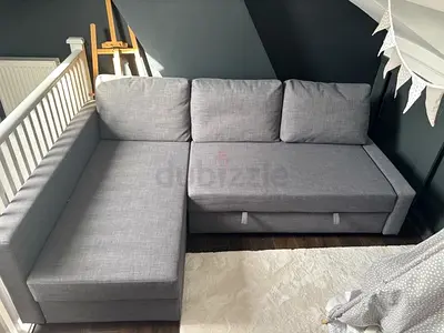 Light Grey L-Shaped Sofa Bed with Storage - Good Condition