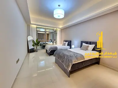 Luxurious and elegant two-bedroom apartment with a living room, fully furnished with brand new, high-end furniture, in a prime location with a gym, sw