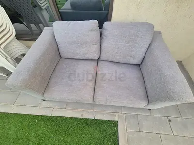 Used 2-Seater Grey Fabric Sofa - Comfortable and Sturdy
