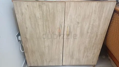 Small wooden storage cabinet with double doors - good condition