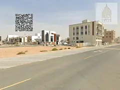 Residential and commercial corner land in Al Bahia