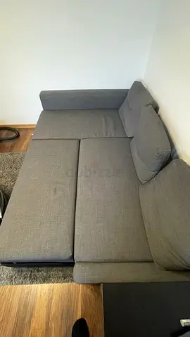 Grey L-shaped Sofa Bed — Compact Corner Couch in Good Condition