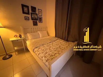 For monthly rent in Ajman - Studio apartment semi-detached kitchen, open view, fully furnished new with elegant furniture and a fully equipped kitchen