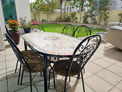 Outdoor mosaic dining table with 6 woven-seat metal chairs - and 3 small tables, very good condition