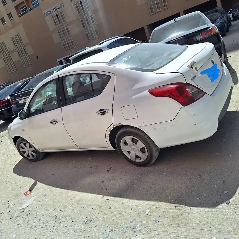 Nissan Sunny 2013 — photo 1 of 4