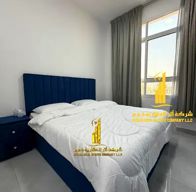 For monthly rent in Ajman, two-bedroom apartment with a balcony open view, fully furnished new with elegant furniture and a fully equipped kitchen