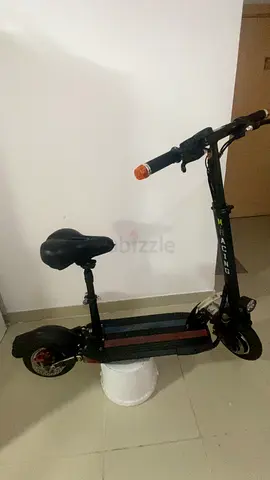 Electric E-Scooter with Seat — Good Condition, Ready to Ride