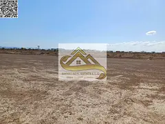corner 2 roads in masfout 8 between villa