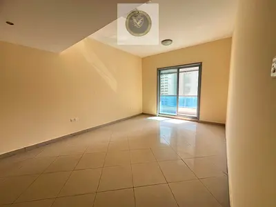 Free air conditioning, two bedrooms and a living room with built-in wall wardrobes, featuring a city view in Al Taawun.