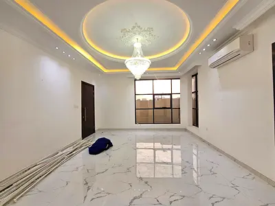 New villa - first occupancy - behind Al Hamidiya Park - 5 master bedrooms - 7 bathrooms - large living room + large majlis - outdoor parking