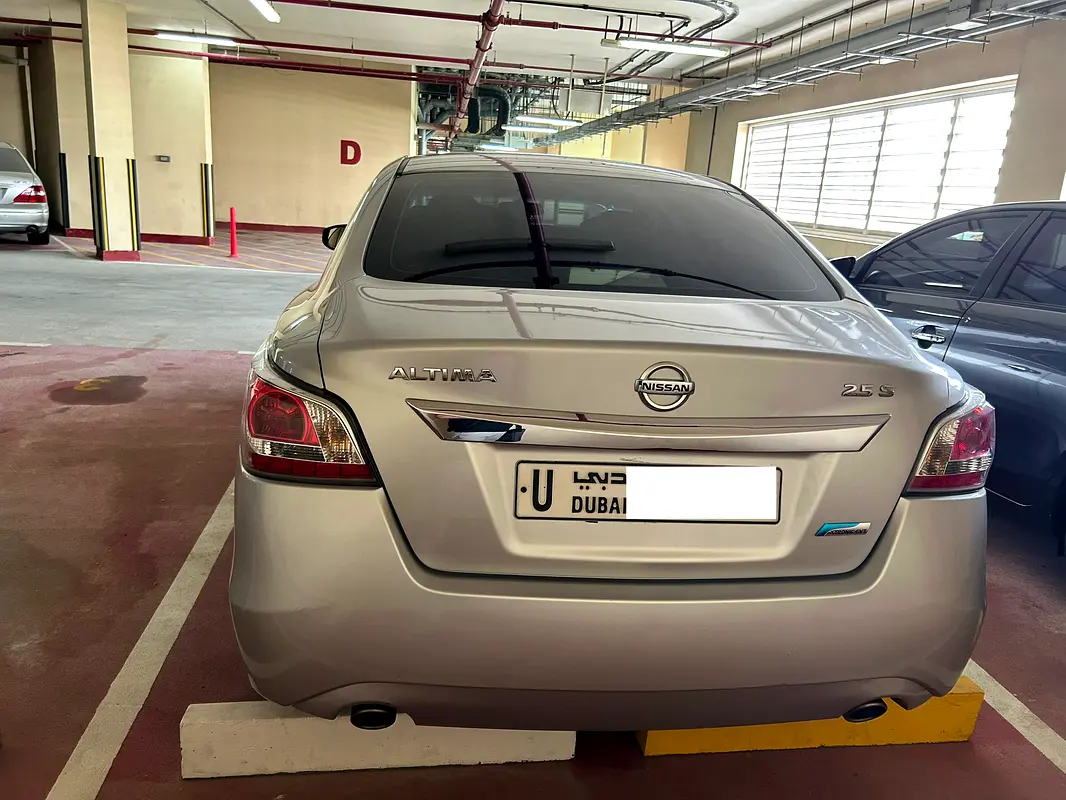Nissan Altima 2015 — photo 1 of 4