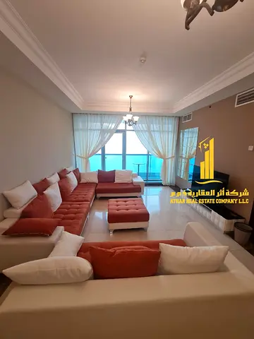 Furnished duplex apartment with three bedrooms, living room, and maid's room for monthly rent in Ajman - Corniche - Residence Towers