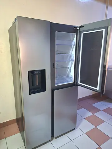 Samsung almost new side by side fridge freezer