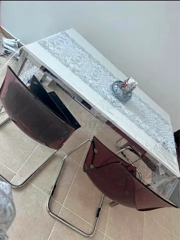 Transparent Pink Chairs with white Table