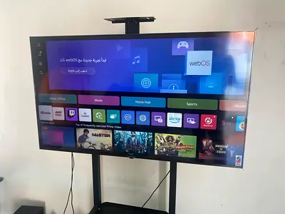 55-inch Smart TV (LG webOS) on Floor Stand - Good Working Condition