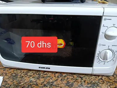 Nikai countertop microwave - working, budget price